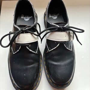 Dr. Martens oxfords with white buckle strap